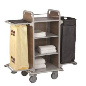 Caddie Valet Tahiti S, cadre en tube d'acier et revêtement peint gris clair (RAL 9006) panneaux d'habillage latéraux et arrière en HPL (choix de 3 couleurs) avec options SAC (support Sac à linge) et PVC (support Sac déchets) dimensions ext. (options plié): 690 x 566 x 1491 mm pare-chocs intégral non marquant, 2 étagères réglables, 4 roulettes pivotantes 150 mm ø dont 2 à freins, poids: 37 kg., charge utile: 150 kg. transport départ usine